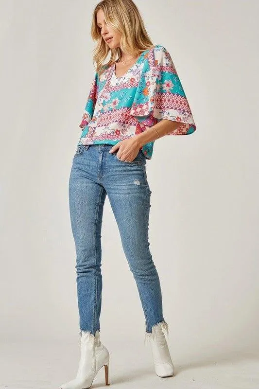 Island Getaway- print flutter sleeve top